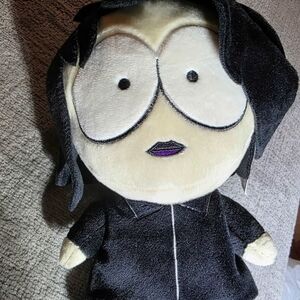 Black and Cream Plush Toy
